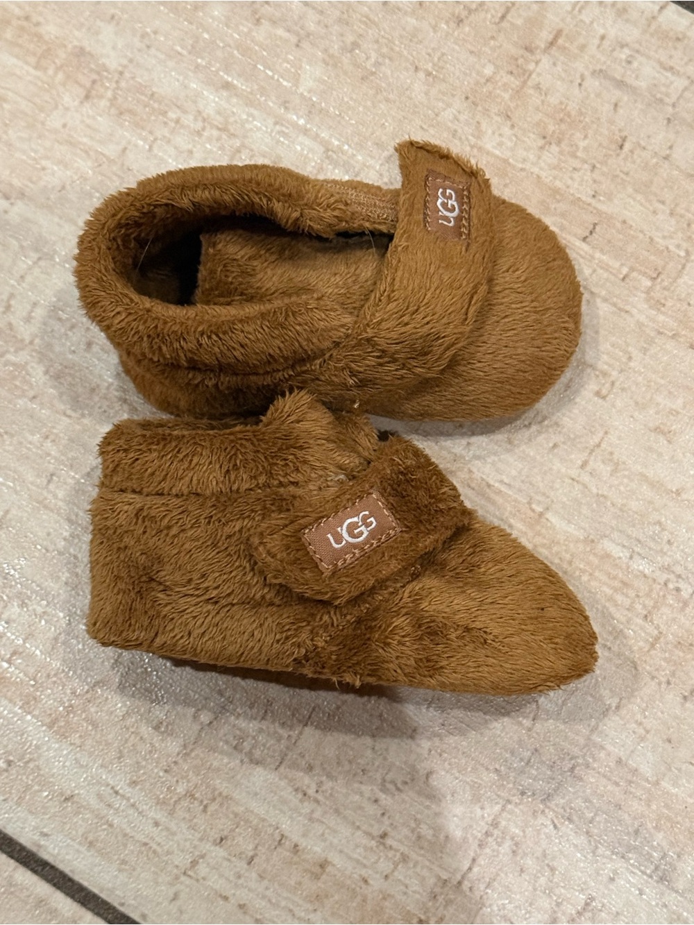 UGG soft booties for baby. 5” long. So soft, so cute. Barely worn.